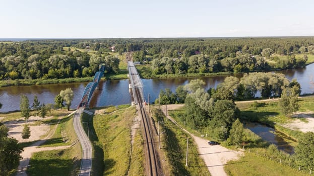Gauja river railroad bridge Latvia aerial drone top view