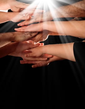 close up shot of hands and lightbeams