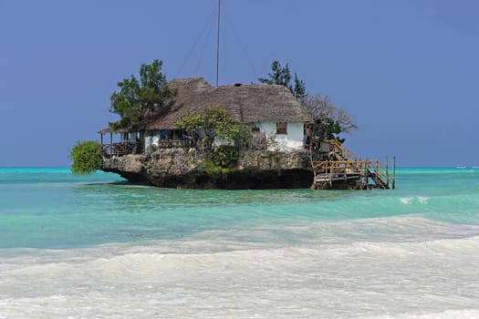 Restaurant on small rock island in Zanzibar Tanzania
