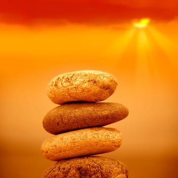 close up shot of stone pile over sunset