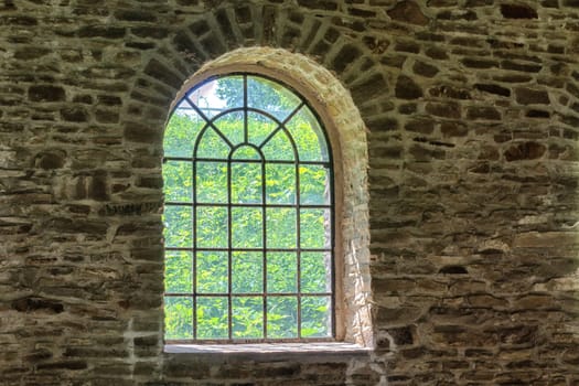 Historic old cast-windows in an old abandoned factory