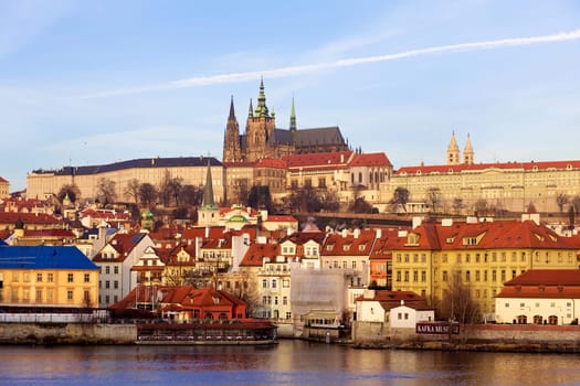 Prague St. Vitus Cathedral and Mala Strana at evening over Vltava river, Czech Republic