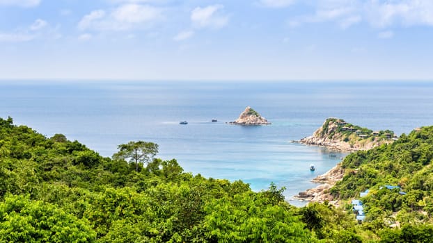 Beautiful nature landscape blue sea at Aow leuk bay under the summer sky from high scenic view point on Koh Tao island is a famous tourist attraction in Surat Thani, Thailand, 16:9 widescreen