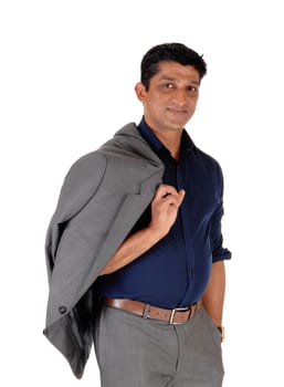 A young east Indian business man standing in a gray suit with his jacket.over his shoulder, isolated for white background.