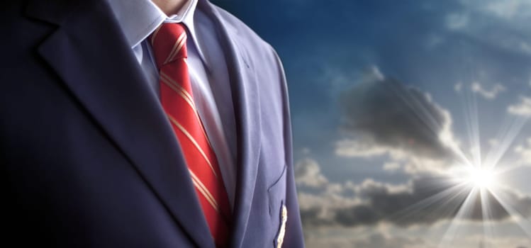 an image of a businessman and sunbeams