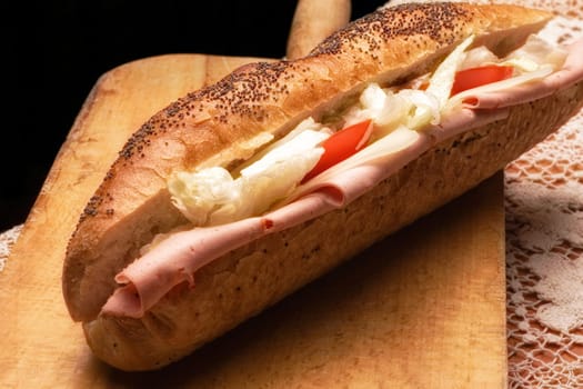 close up shot of fresh salami sandwich