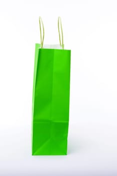 Paper shopping bags on white background
