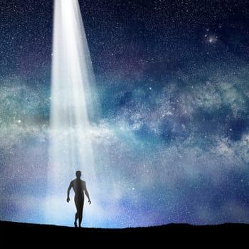 conceptual image of silhouetted man and abstract universe lights. NASA galaxy images manipulated and used https://nasasearch.nasa.gov/search/images?utf8=%E2%9C%93&affiliate=nasa&query=galaxy+images