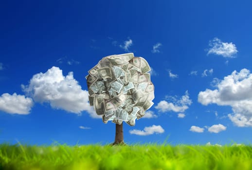 Conceptual image of money tree on green landscape
