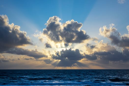an image of sunset clouds and beach