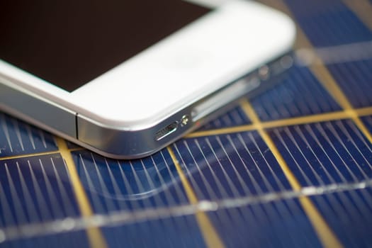 Green energy concept - Mobile Phone charging with solar power