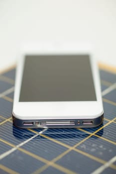 Green energy concept - Mobile Phone charging with solar power