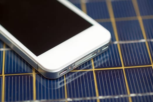 Green energy concept - Mobile Phone charging with solar power