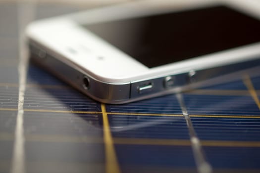 Green energy concept - Mobile Phone charging with solar power