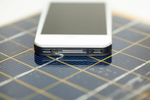 Green energy concept - Mobile Phone charging with solar power