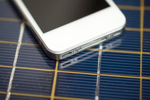 Green energy concept - Mobile Phone charging with solar power