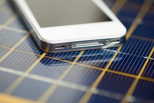 Green energy concept - Mobile Phone charging with solar power