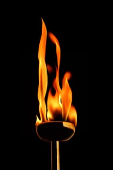 close up shot of burning flaming torch.
