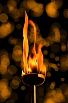 close up shot of burning flaming torch.
