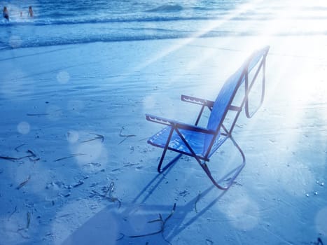 close up shot of beach chair on beach