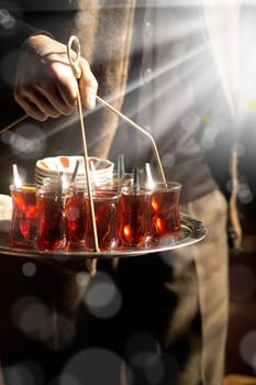 Close up shot of full tea tray in istanbul.