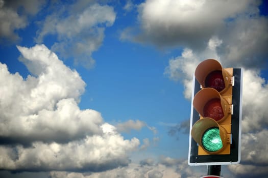 close up shot of traffic light on green