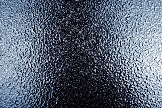 close up shot of grey shiny metal surface.