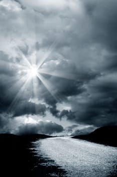 an image of road and cloudy sky