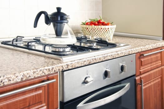 close up shot of oven and stove in domestic kitchen