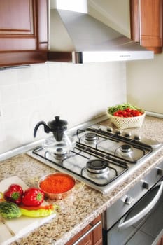 close up shot of oven and stove in domestic kitchen