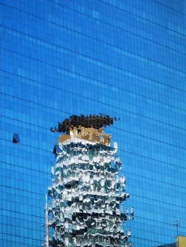 close up architectural detail from tall glass building in Thailand