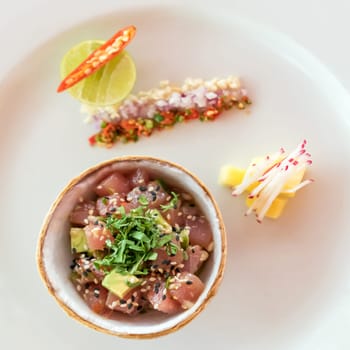 Thai style spicy tuna salad with thai traditional herb.