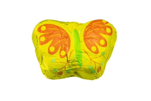 Chocolate butterfly in a colorful packaging on white background isolated. Concept sweets.