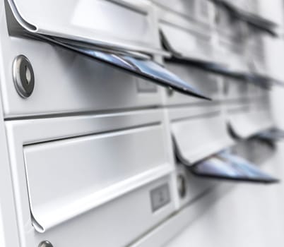Modern mailboxes filled of leaflets. Business and advertising concepts. Shallow depth of field.