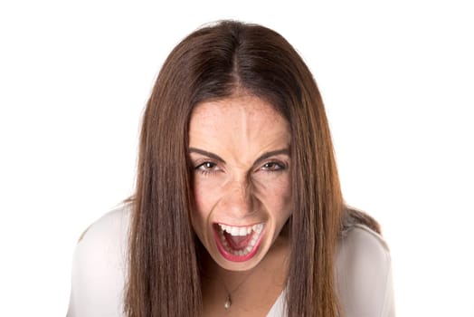 Angry casual young woman isolated in a white background