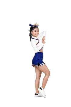 Young asian cheerleader in action isolated over white background