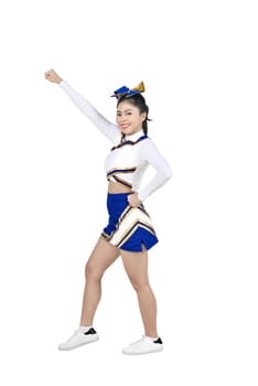 Cute asian cheerleader in action isolated over white background
