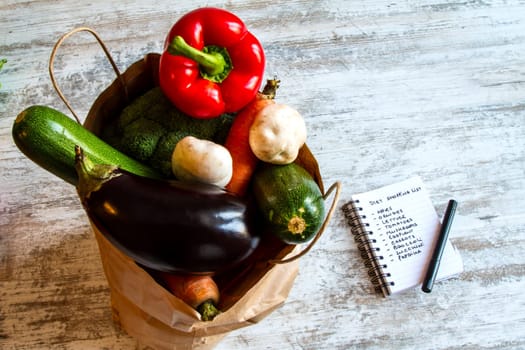 Buying vegetables and fruits, after doing the shopping list.