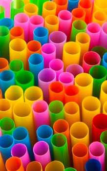 Abstract colourful image showing a multitude of drinking straws