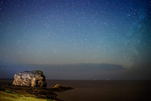 Fungus Rock in Gozo, here seen under a night sky full of stars.