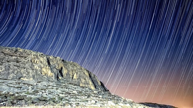 Extreme long exposure image showing star trails around the Polar Star or Polaris.