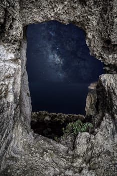 Moonlit rock cut window at Gebel Ciantar, Malta.