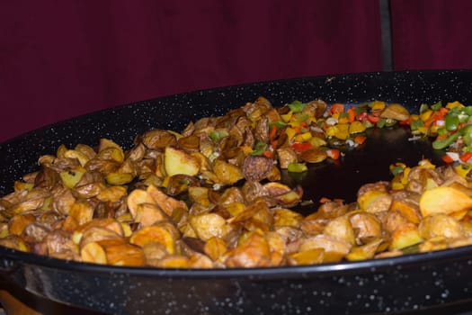 Yummy medieval stir fry in a big old iron pan