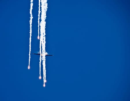 LUQA, MALTA - SEP 26 - F16 of the RNLAF Demoteam flied by Capt. Ralph (Sheik) Aarts releasing flares during the Malta International Airshow 26th September 2009
