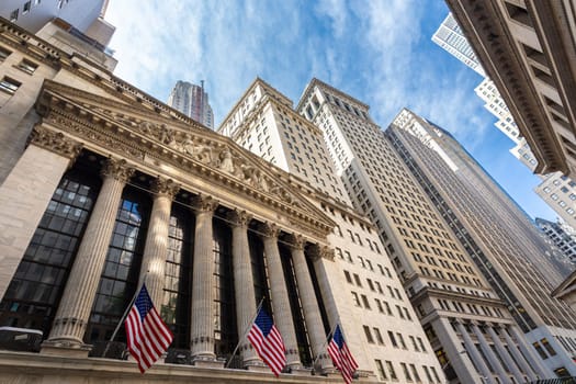 Exterior of New york Stock Exchange, largest stock exchange in world by market capitalization and most powerful global financial institute. Wall street, lower Manhattan, New York City, USA.