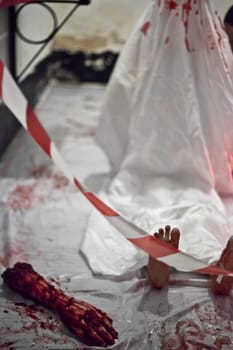 Dismemberment and tagged corpse at a scene of crime investigation