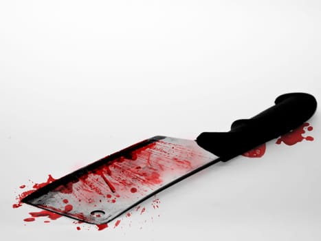 Cleaving knife over white backdrop