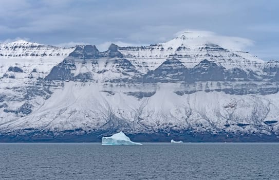 Dramatic Ridge on an ocean inlet, along a Remote Coast of Greenland along the Nugssuaq Peninsula