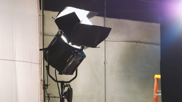 Big spotlight or lighting equipment for film movie or vdo shooting production in studio.