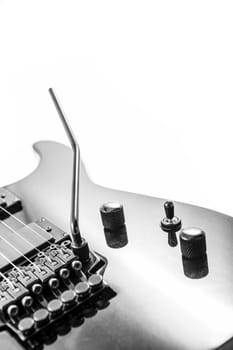 Electric guitar detail shots over white backdrop
